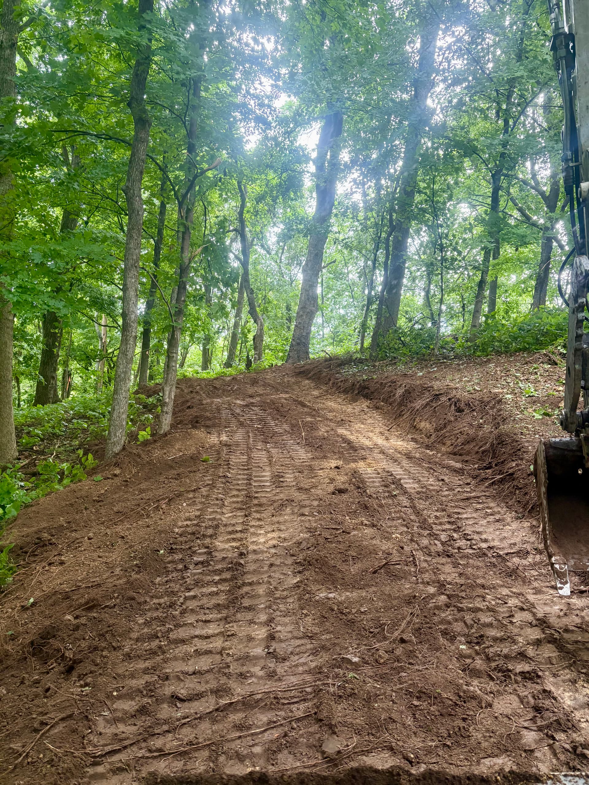 We Cut Trails and Roads Through Land Others Won't Touch image
